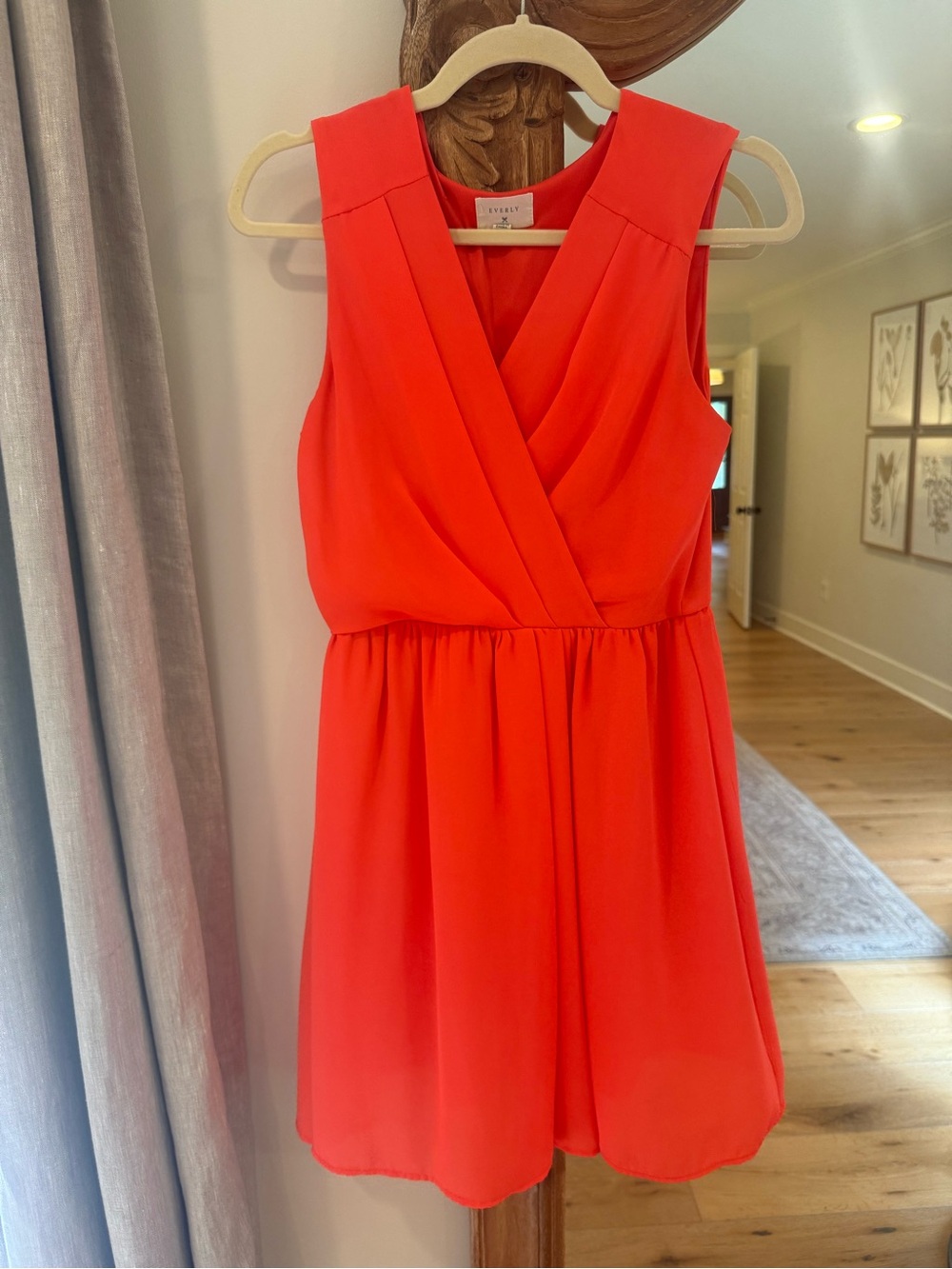Everly Sleeveless Wrap-Front Mini Dress in Vibrant Coral-Red